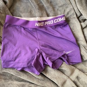 Purple Nike pro shorts